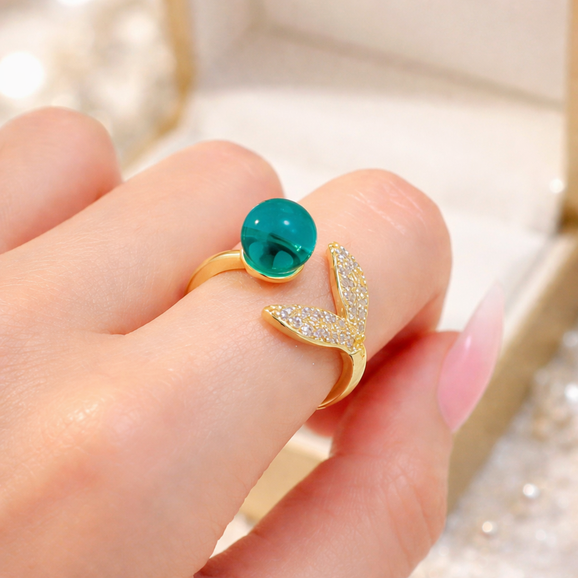 Gold ring with a turquoise gemstone