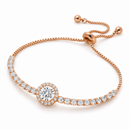Rose gold bracelet with a central diamond and smaller diamonds along the chain